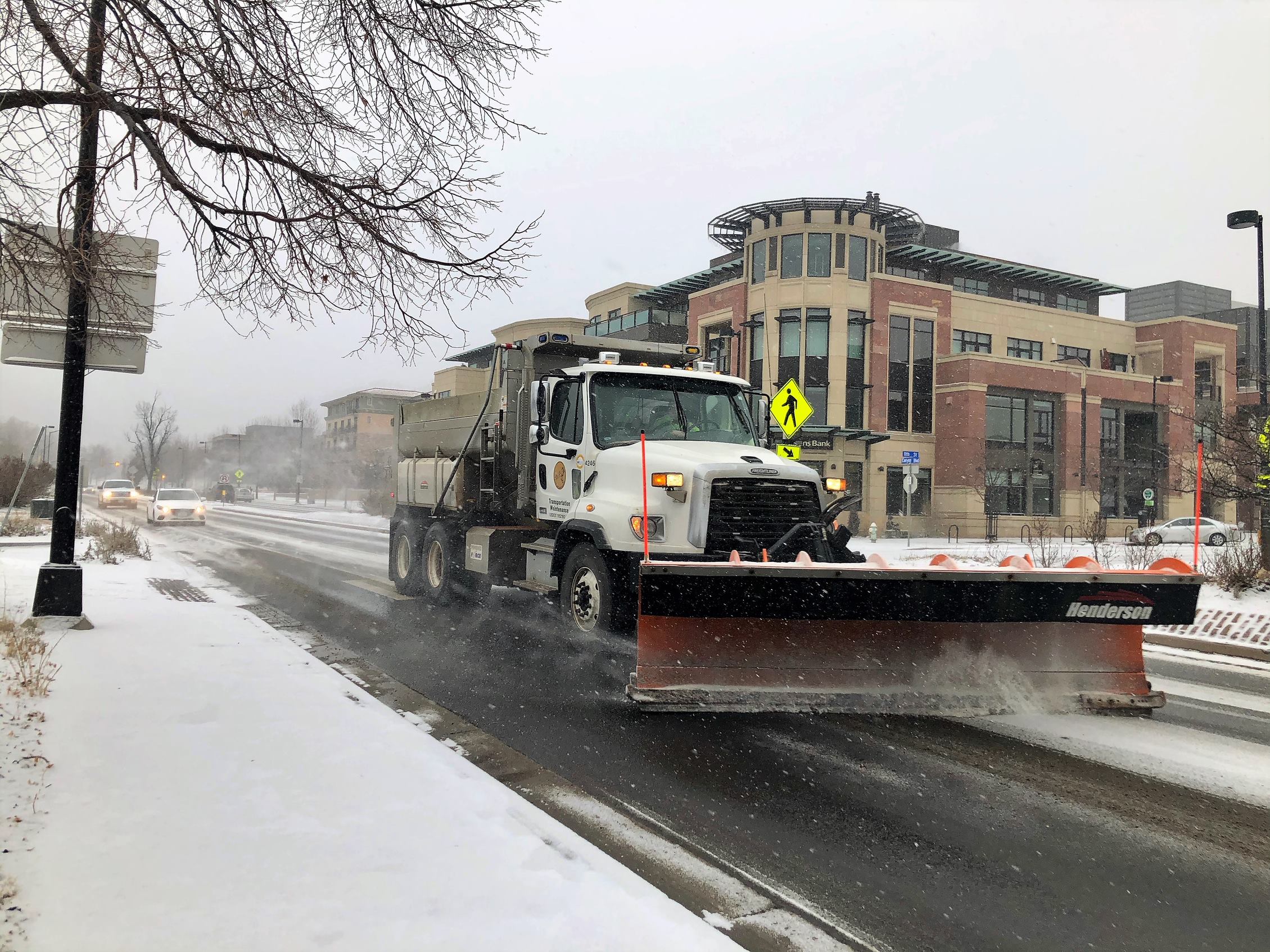 Boulder snow plow clearing the road