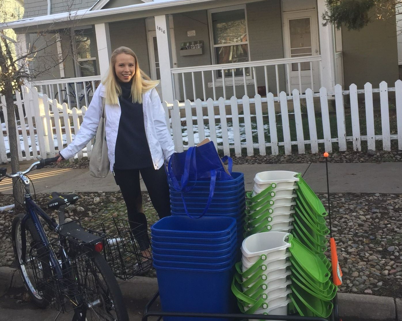 EcoVisits student leader delivering recycling and compost bins