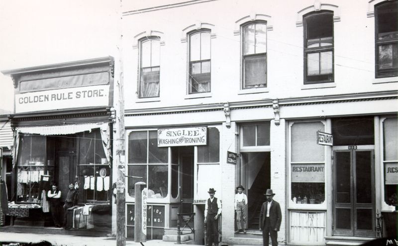 Sing Lee Laundry at 1112 Pearl St. and the Golden Rule Store at 1114 Pearl St.