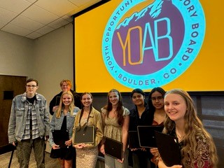 YOAB members receiving the 2023-2024 Outstanding Youth Volunteer Award.