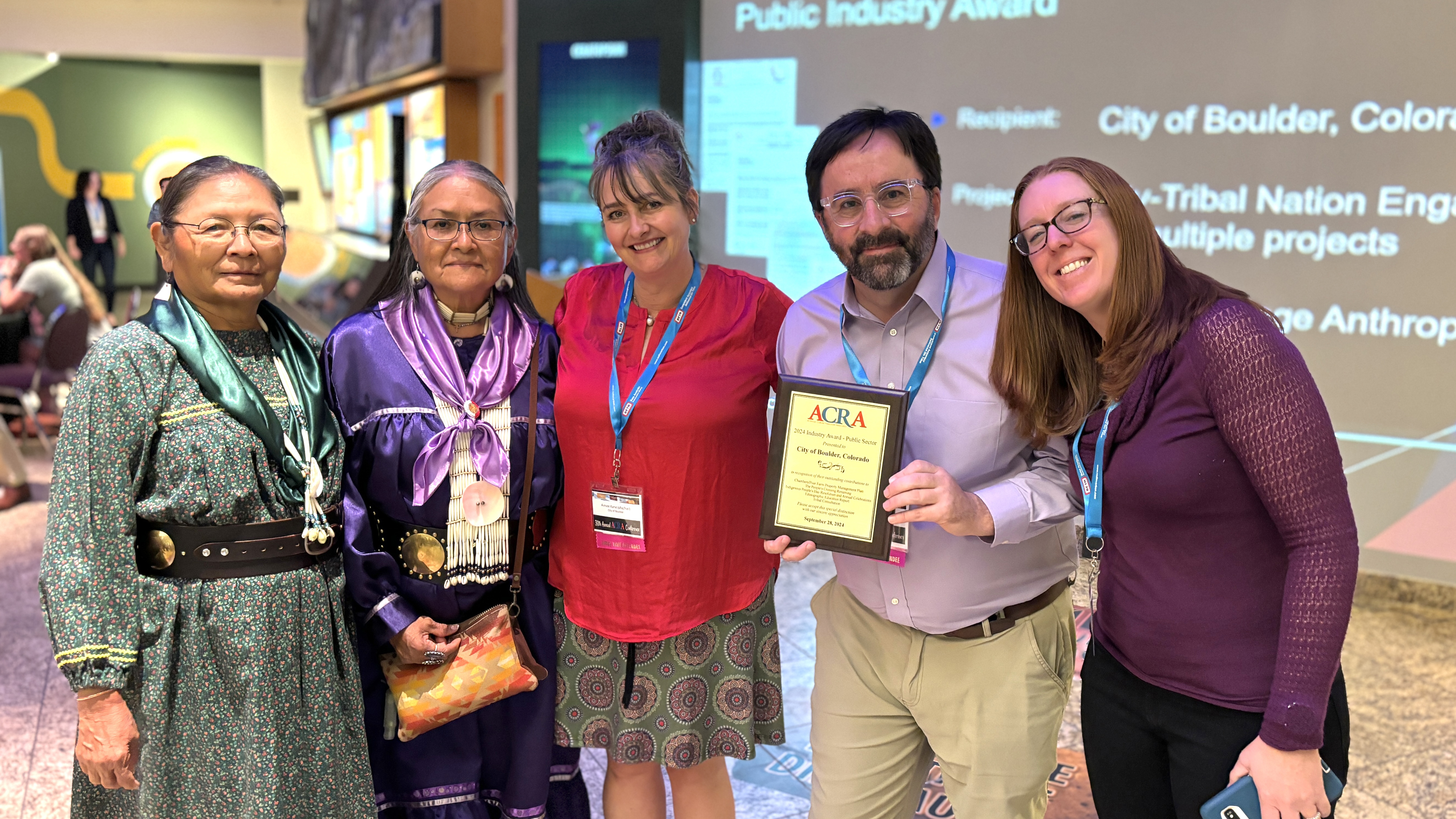 Staff, Tribal Representatives and Heritage Anthropology staff pose for a picture after city receives ACRA award