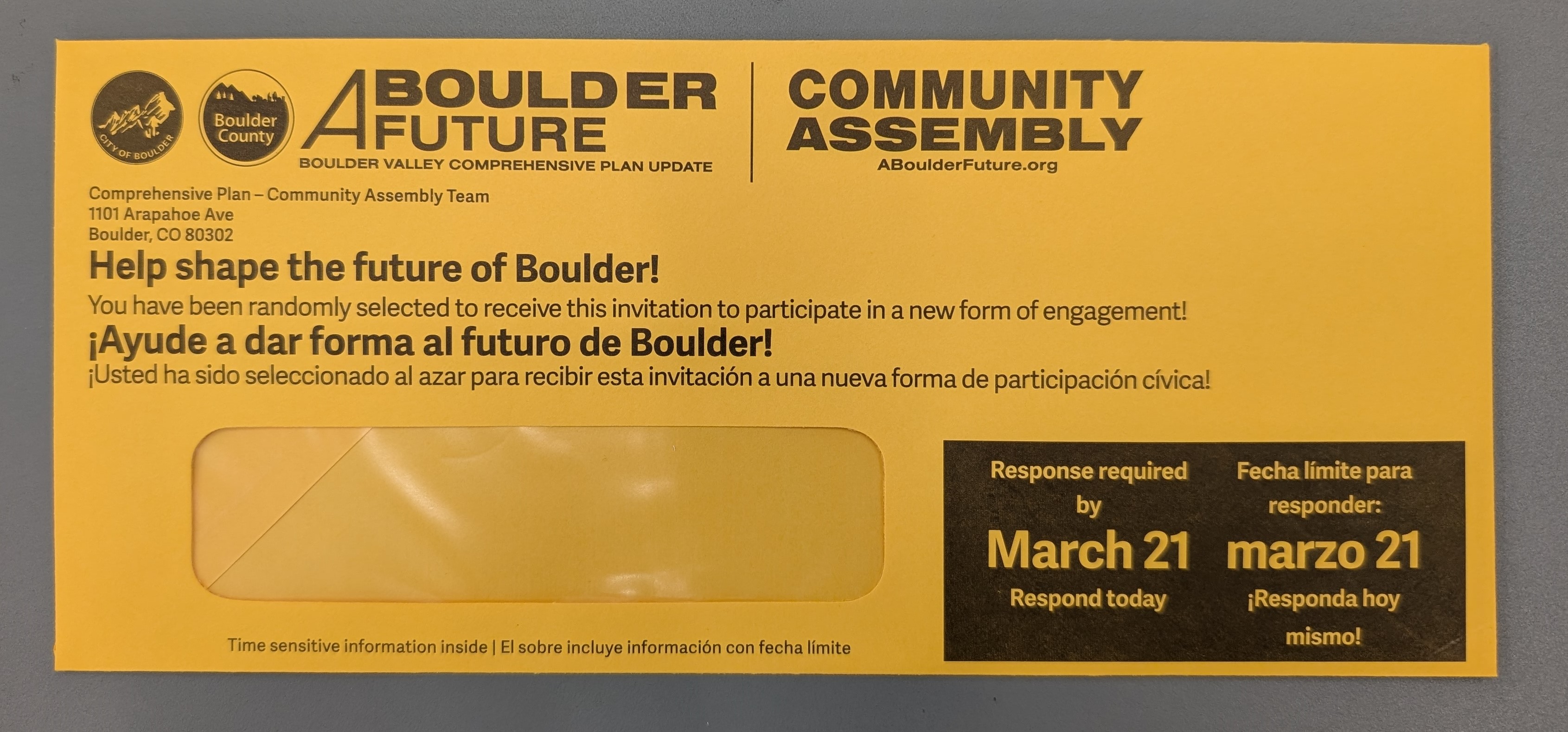 yellow envelop mailed for community assembly.