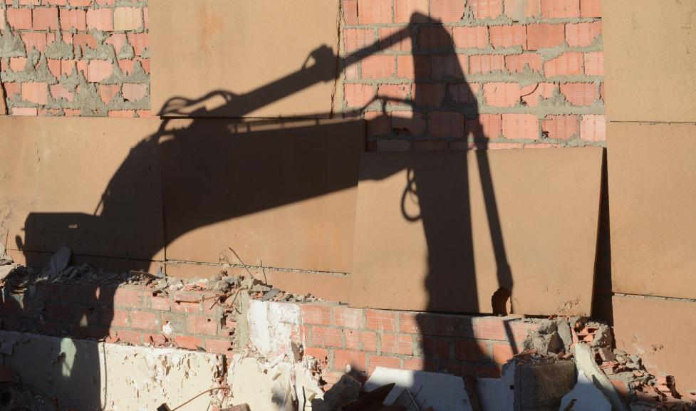 Demolition backhoe shadow