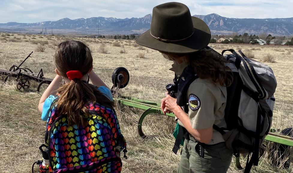 Child with OSMP Naturalist on field trip