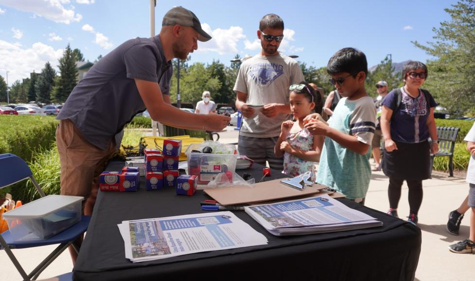 Transportation staff doing community engagement with youth 