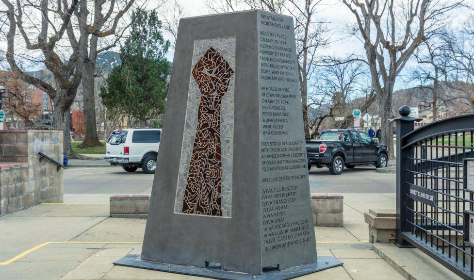 Large sculpture with a power fist titled 'El Movimiento Sigue' (The Movement Continues)