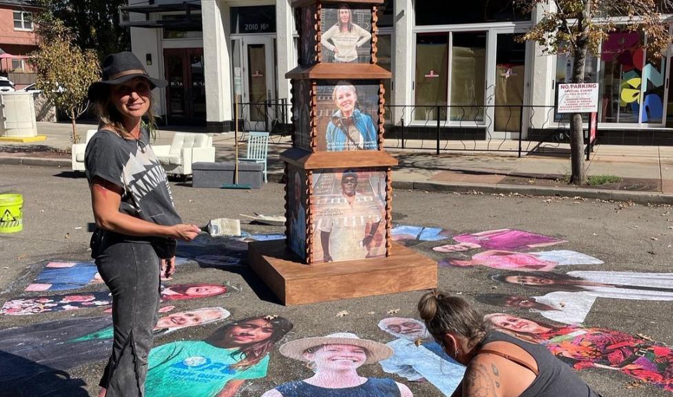 Artist creating a temporary project in the street