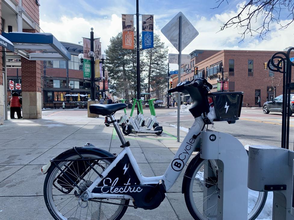 B-cycle and Lime scooters parked in downtown Boulder