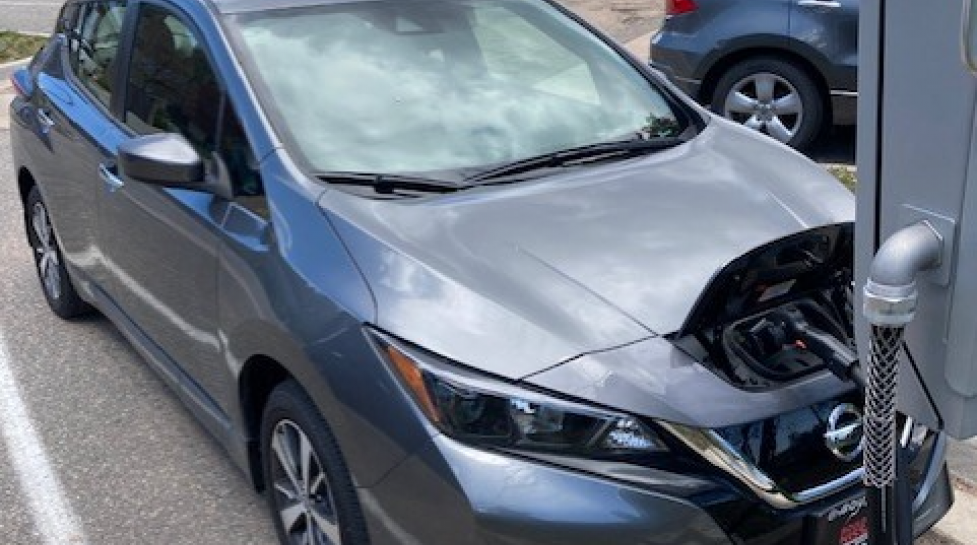 A city of Boulder fleet electric vehicle charges at the innovative two-way charger at the North Boulder Rec Center