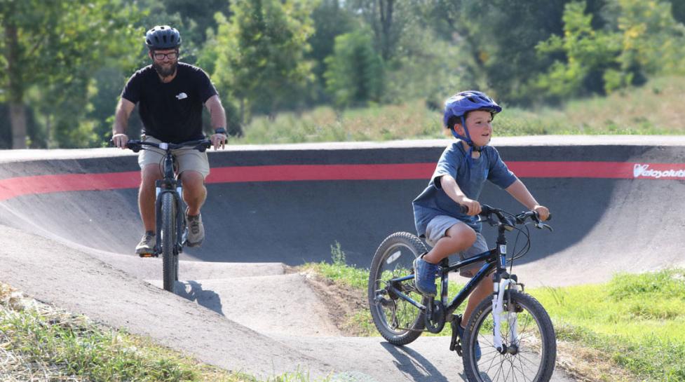 Father and son riding bikes