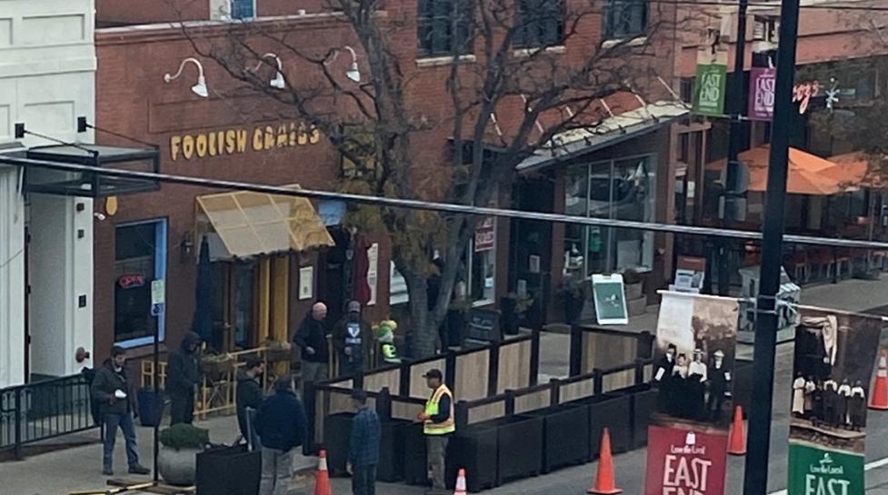 Outdoor dining MODSTREET structure being installed at 16th and Pearl streets