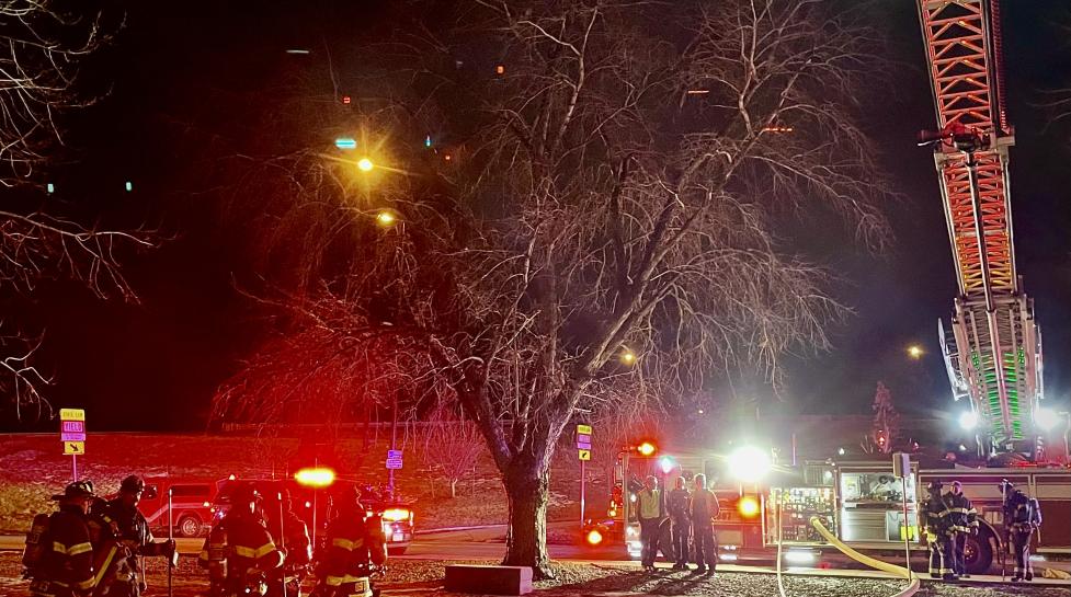 Boulder Fire-Rescue Engine and Firefighters at the scene of a structure fire on Thunderbird Drive