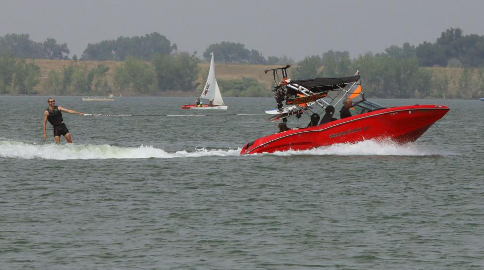 Boulder Reservoir boating with water skiier