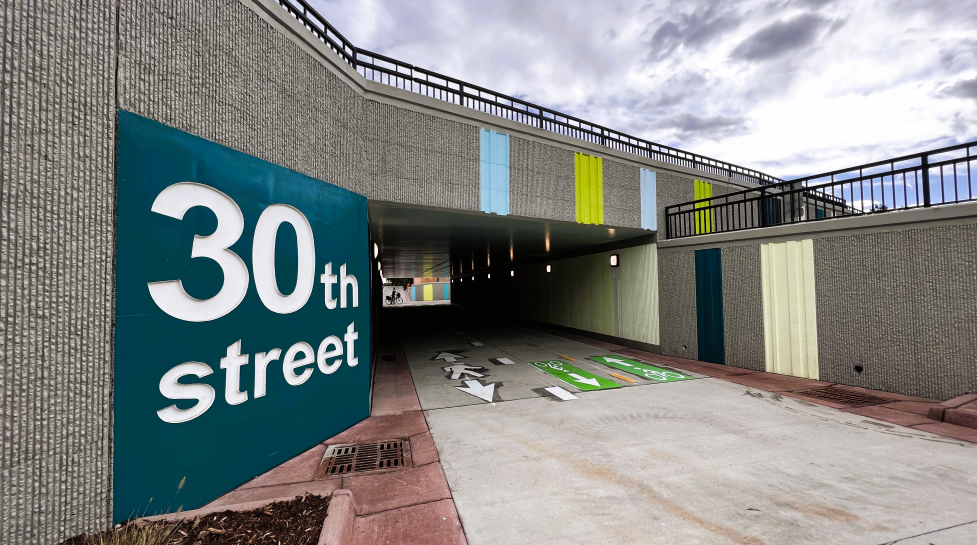 underpass at 30th Street with bright, colorful designs