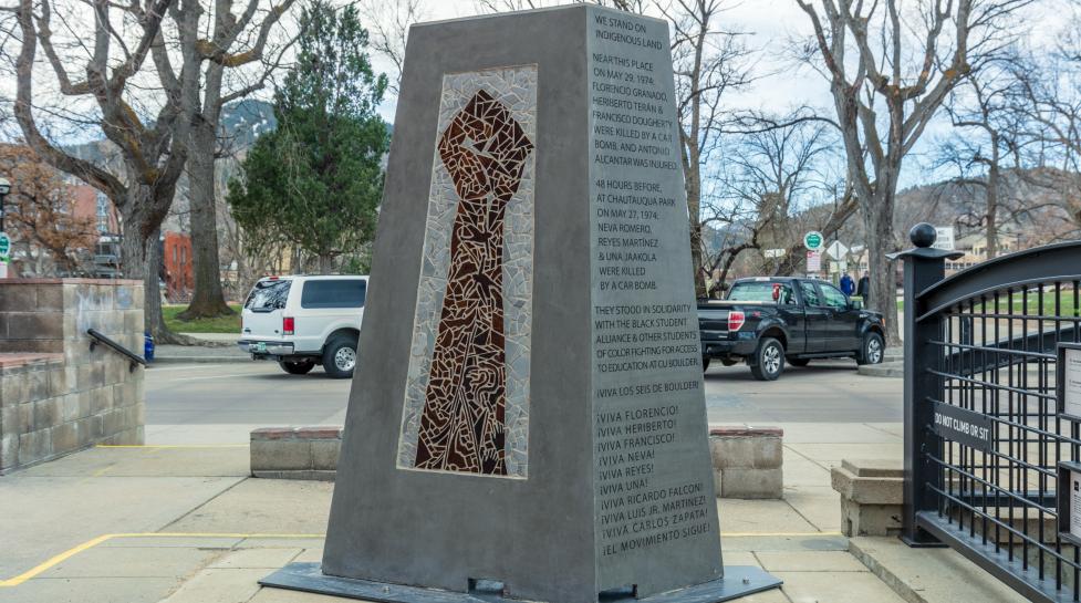 Large sculpture with a power fist titled 'El Movimiento Sigue' (The Movement Continues)