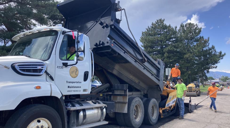 City staff repairing potholes