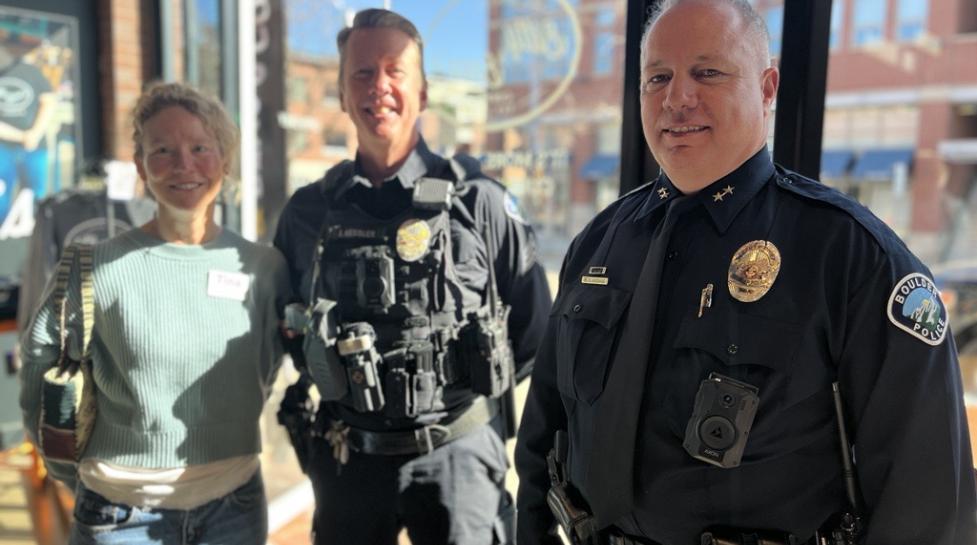 Boulder Police offers smiling for the camera at a past Coffee with a Cop event