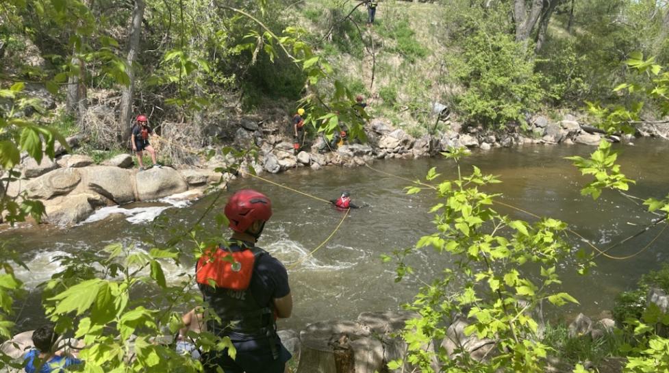 Boulder Fire-Rescue during swift water rescue training near the Boulder Creek