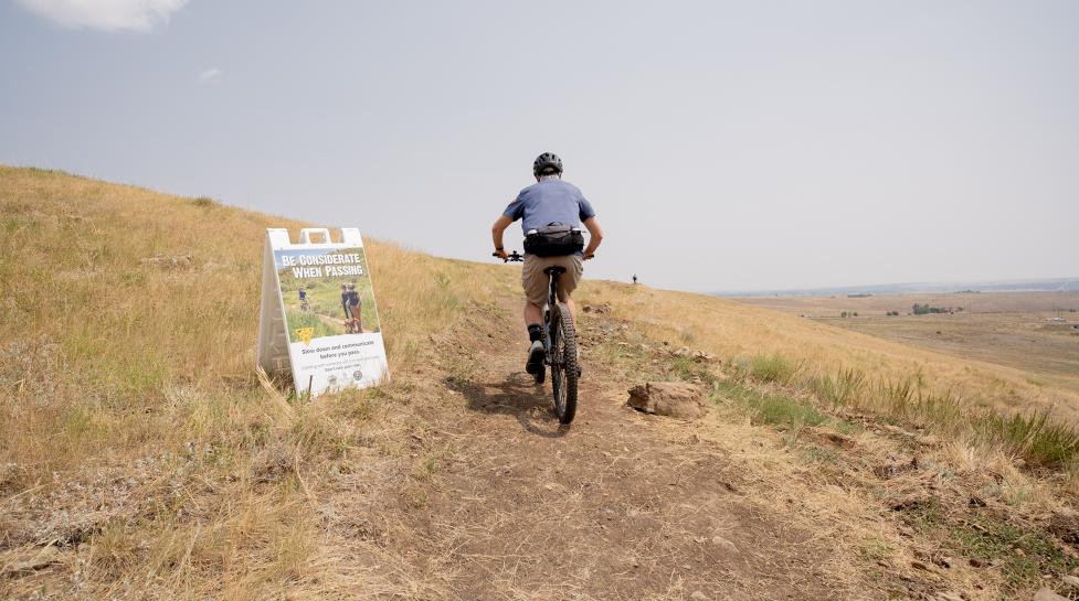 Bicyclist rides on the North Sky Trail