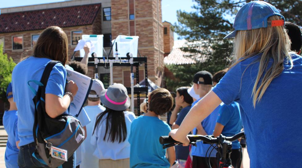 Children at a water activity at CU Boulder