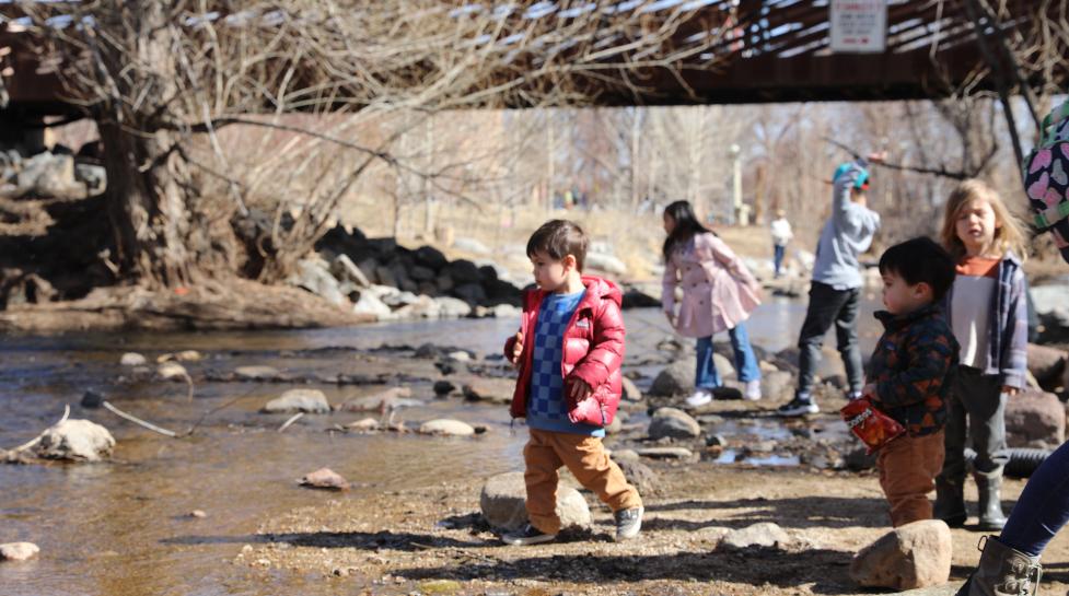 Kids playing in Boulder Creek in the Civic Area park