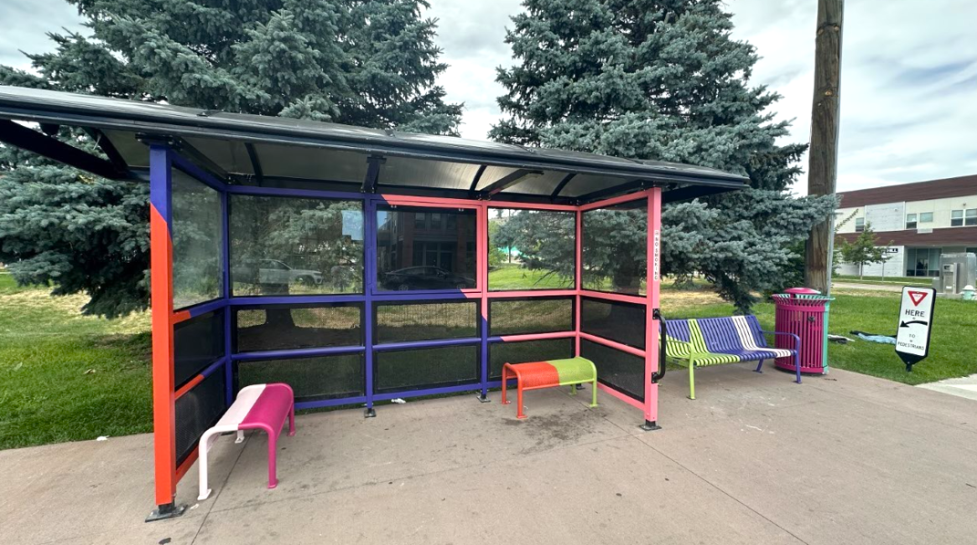 Bus stop and benches painted with colorful designs