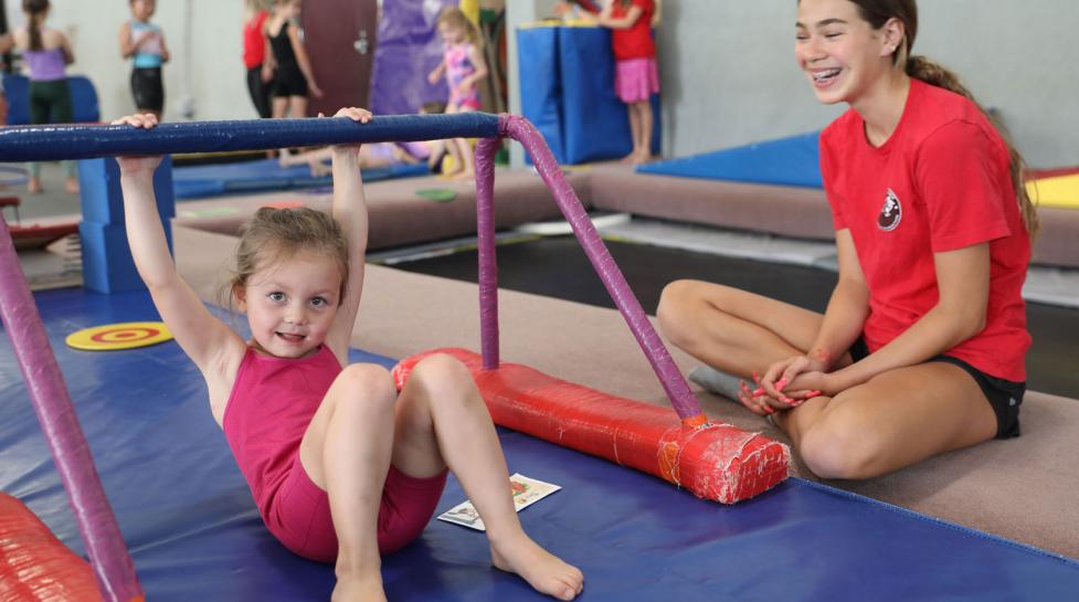 Kid having fun during gymnastics class at North Boulder Recreation Center