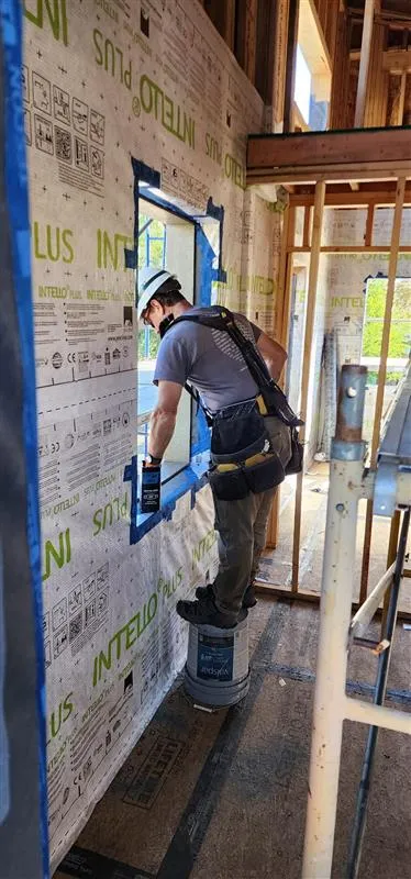 Kurt doing construction at a Habitat for Humanity build.