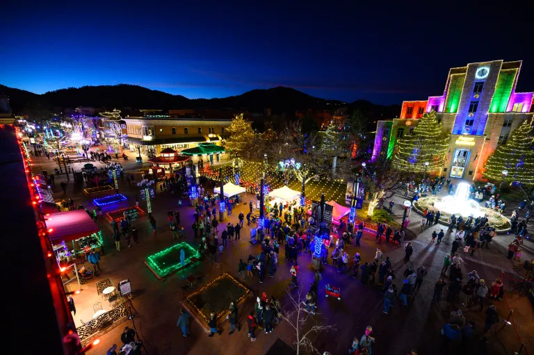 Colorful holiday lights decorating the Pearl Street Mall