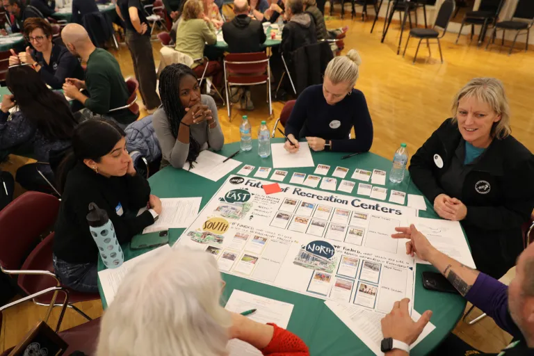 A community members participate in an engagement activity in January 2025.