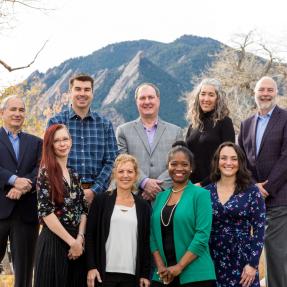 Group photo of Boulder City Council with Flatirons in background