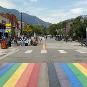 Rainbow stripes across Pearl Street