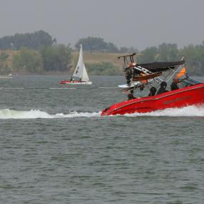 Boulder Reservoir boating with water skiier