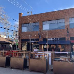 Outdoor dining patio outside of Jungle.