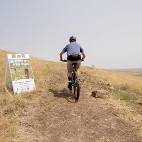 Bicyclist rides on the North Sky Trail