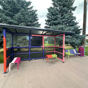 Bus stop and benches painted with colorful designs