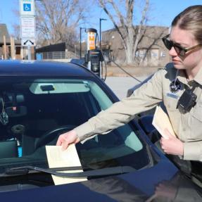 Boulder Parks and Recreation Ranger issuing a citation