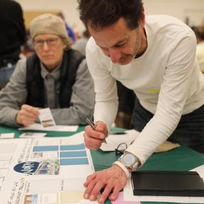 A community member participates in an engagement activity in January 2025.